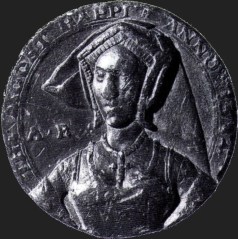 Medalha de 1534 com o busto de Ana Bolena em que se lê a Inscrição "The Most Happy" (A mais Feliz).
