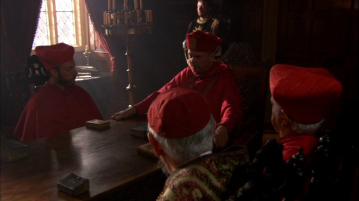 Wolsey (Sam Neill) e os altos membros da Igreja Católica em Inglaterra decidem sobre a validade do casamento real.